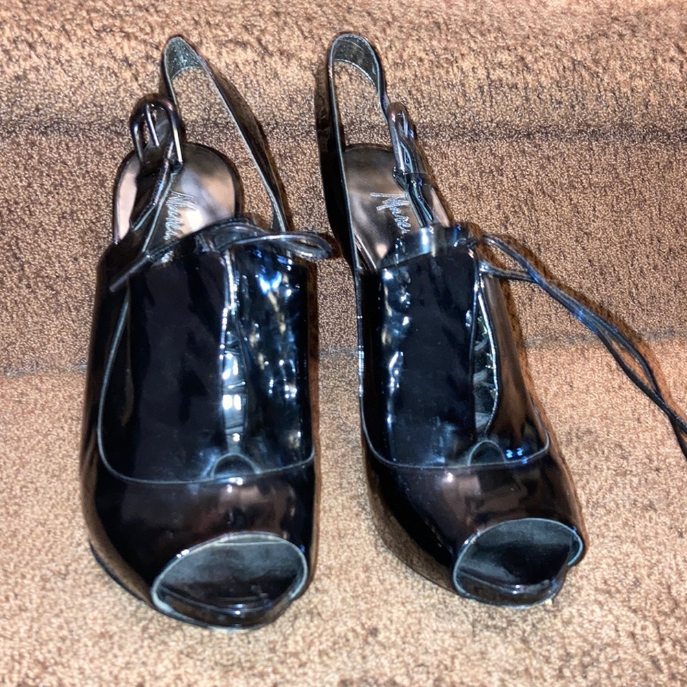 Marciano black patent leather heels size 8 nick on inside of one heel